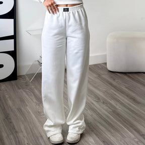 Calça wide leg moletom cintura alta feminina detalhe lateral